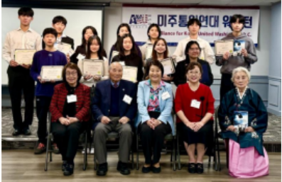 image Taking memorial picture with the award receivers and the judges and the organizer